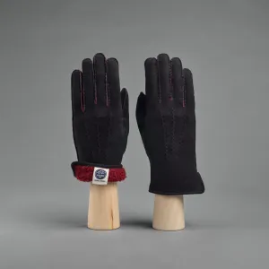 Ladies Gloves from Black Curly Lambskin lined with red Shearling